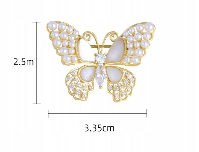 Broche papillon à zircons – doré