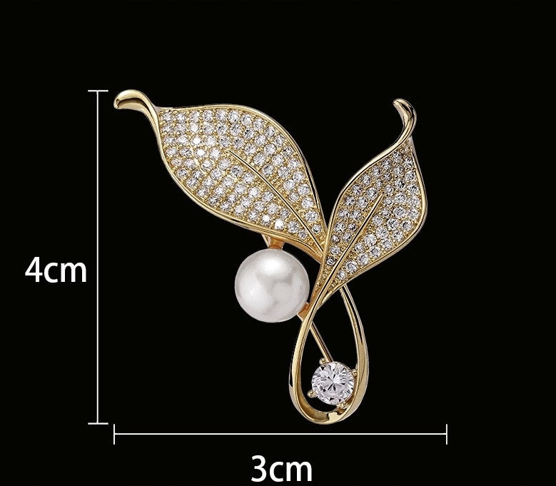 Brosche zwei Blätter mit Zirkonia – goldfarben
