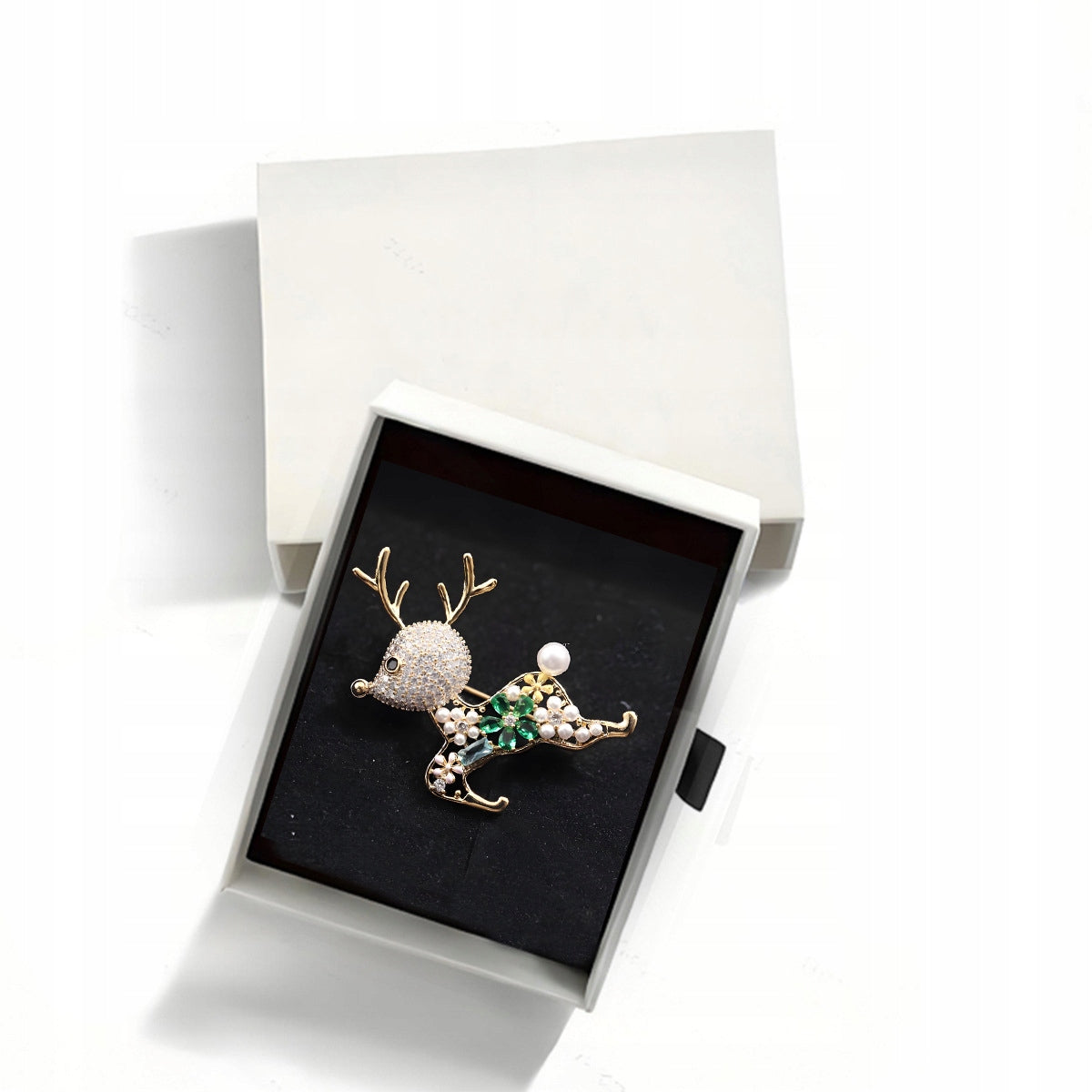 Broche reno con circonitas