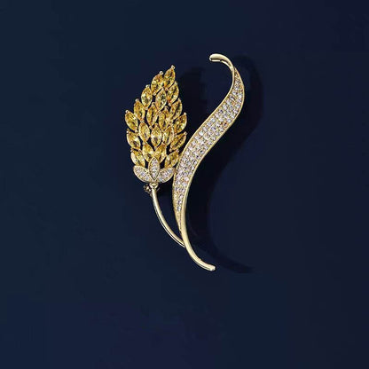 Broche fleur à zircons – doré