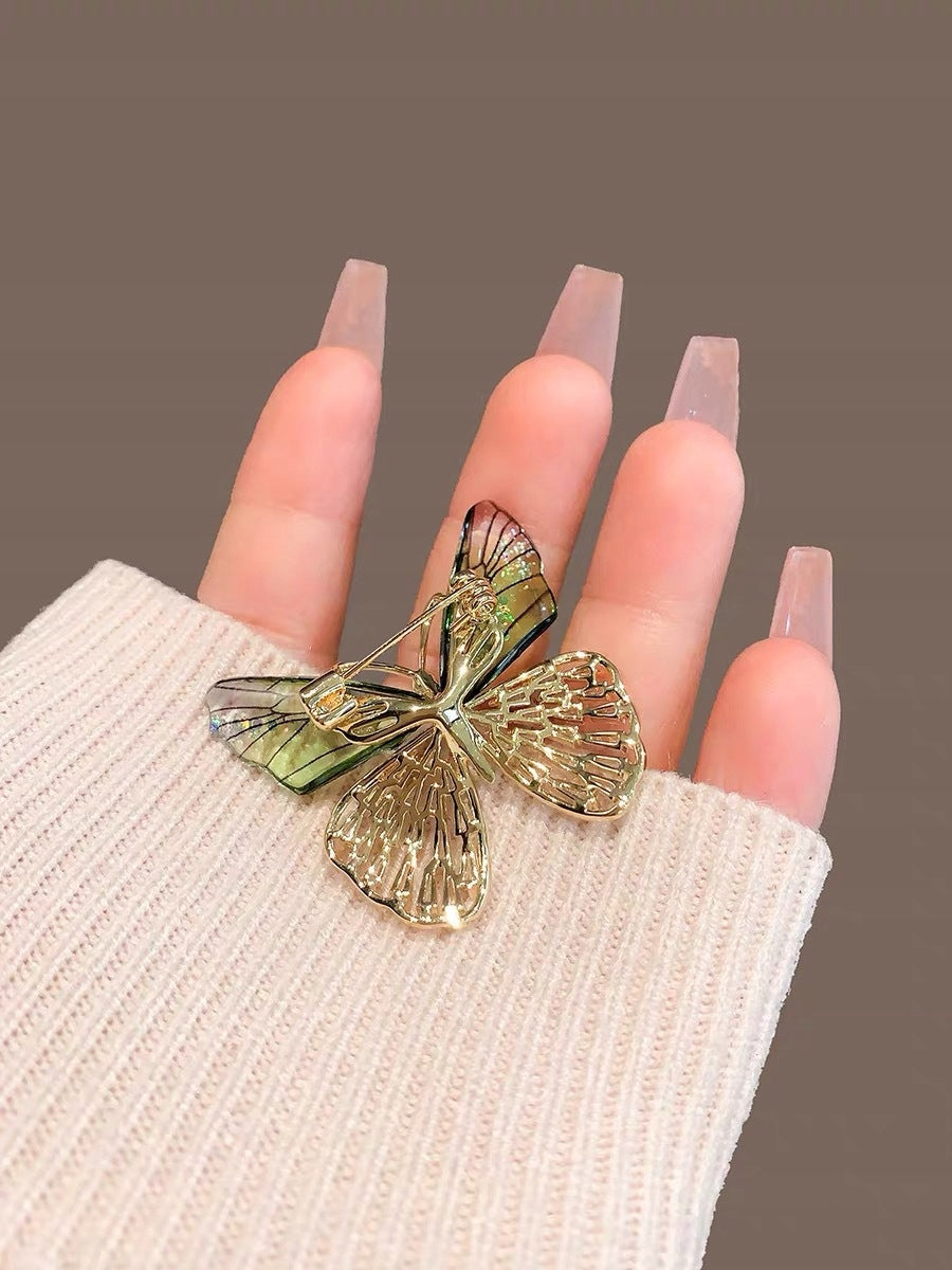 Broșă fluture cu zirconii – aurie și verde