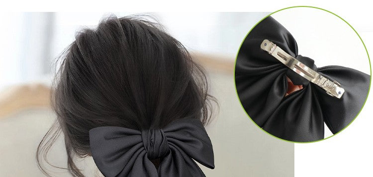 Elegant Black Bow Hair Clip — Stylish Hair Accessory