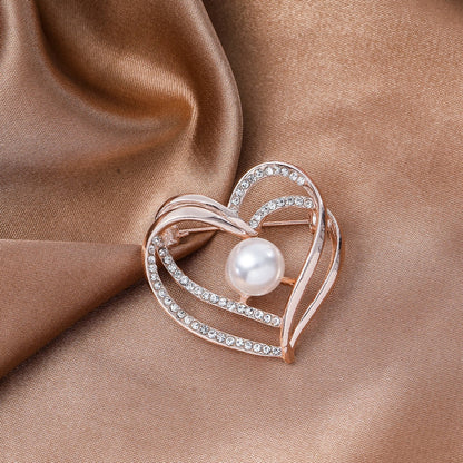 Broche cœur à zircons