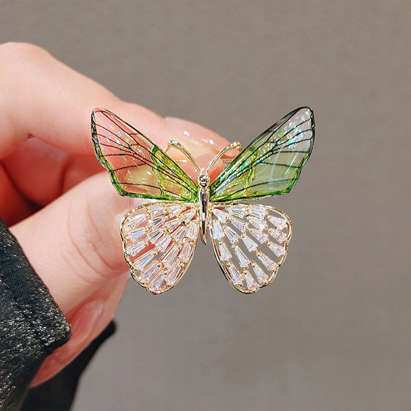 Broșă fluture cu zirconii – aurie și verde