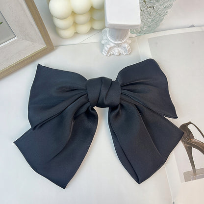 Elegant Black Bow Hair Clip — Stylish Hair Accessory