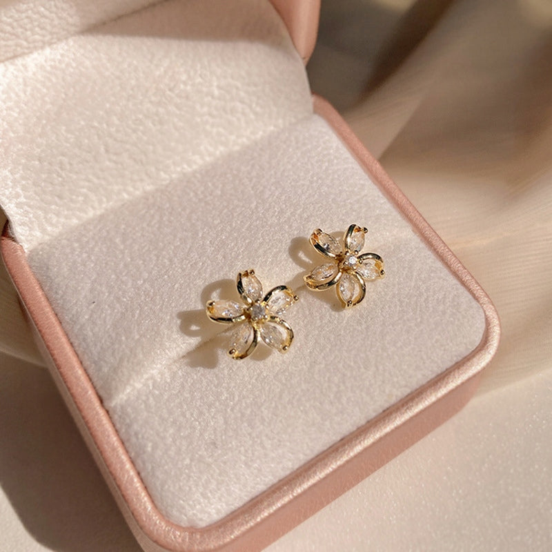 Pendientes de botón con forma de flor – dorado