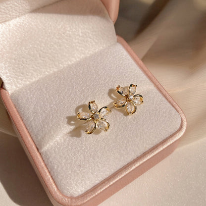 Pendientes de botón con forma de flor – dorado