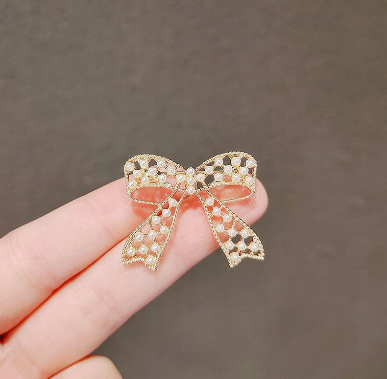 Broche lazo – dorado