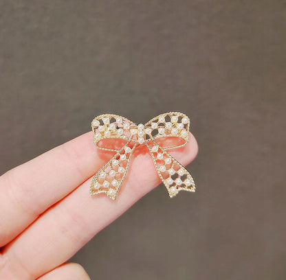 Broche lazo – dorado