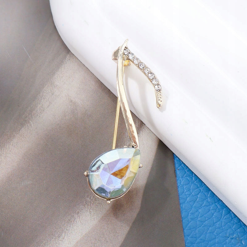 Brosche Musiknote mit Zirkonia – goldfarben