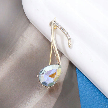 Brosche Musiknote mit Zirkonia – goldfarben