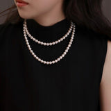 Collier en perles de verre – blanc et argenté
