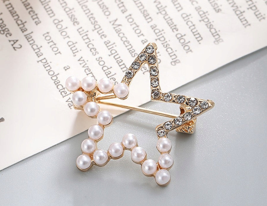 Broche étoile à zircons – doré