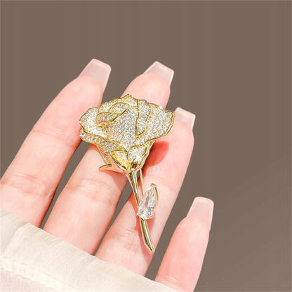 Broche rose à zircons – doré et rose