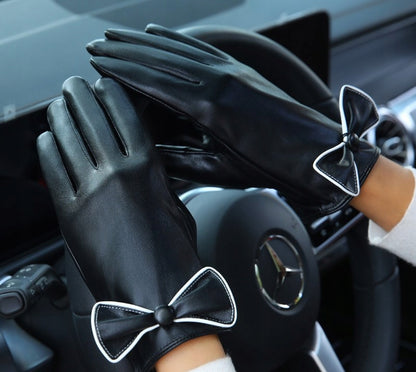 Black Women's Faux-Leather Gloves with a Decorative Bow — Stylish Accessories