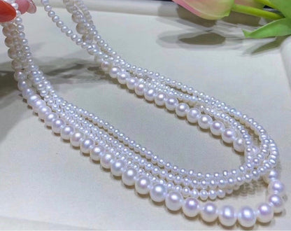Elegant White Glass Pearl Necklace with Silver-tone Details — Classic Retro Style