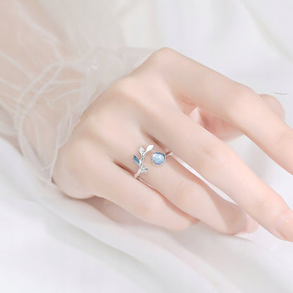 Simple Women's Silver-Tone Ring with a Blue Stone
