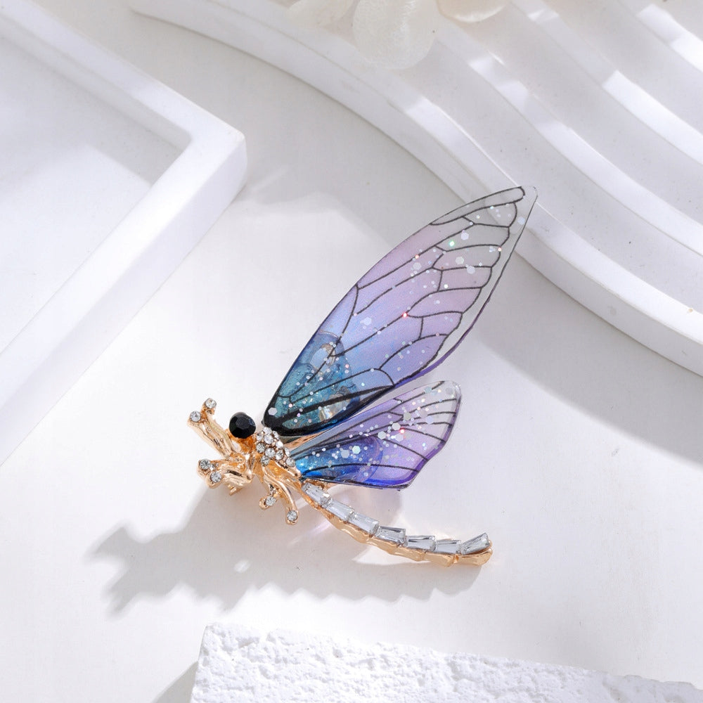 Brosche Libelle mit Zirkonia – goldfarben und violett