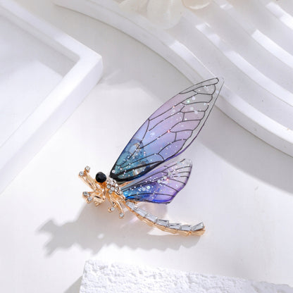 Brosche Libelle mit Zirkonia – goldfarben und violett
