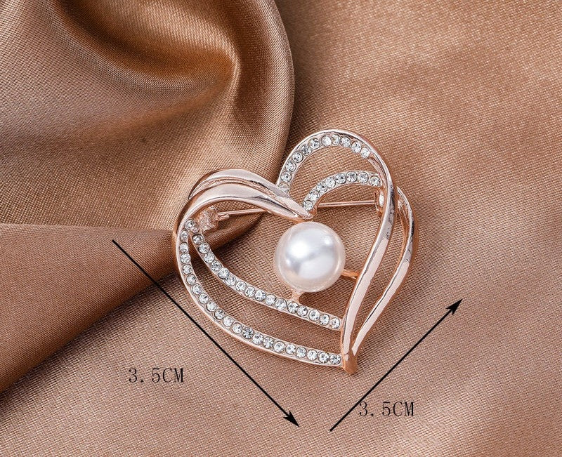 Broche cœur à zircons