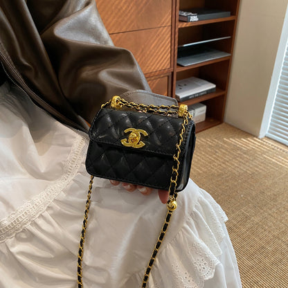 Жіноча стьобана мінісумка – чорний