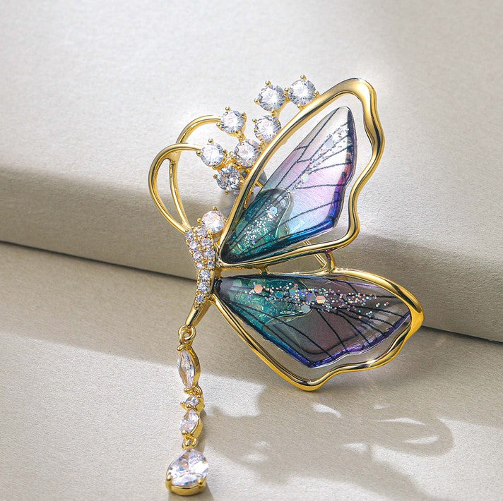 Brosche Schmetterling mit Zirkonia – goldfarben und violett