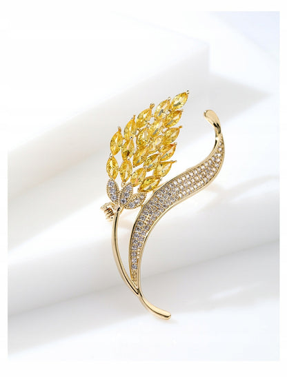 Broche fleur à zircons – doré