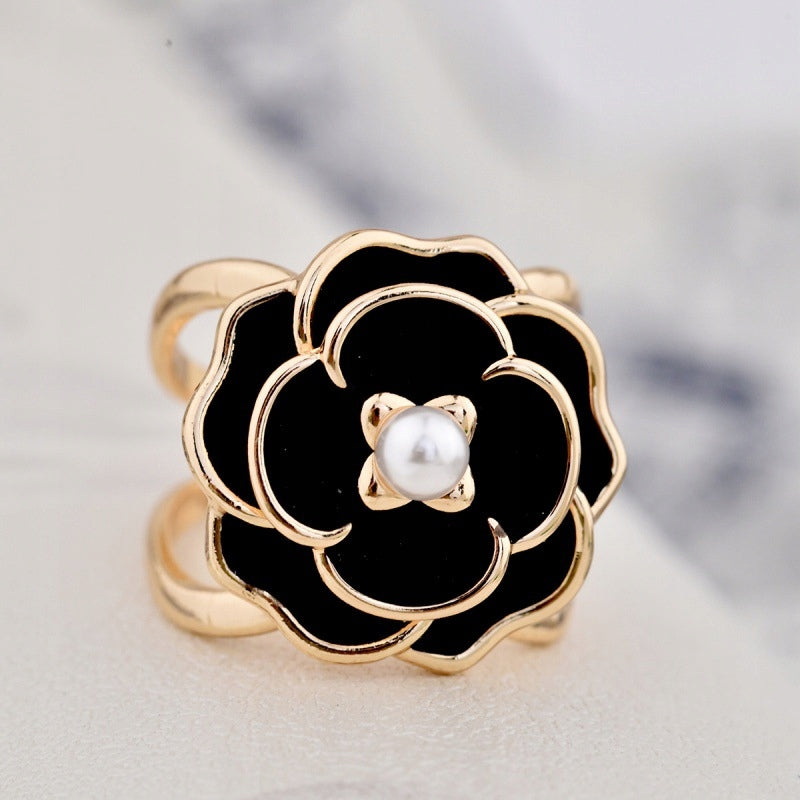 Schalclip mit Blumenmotiv – goldfarben und schwarz
