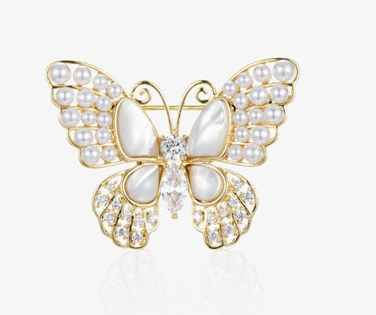 Broche papillon à zircons – doré