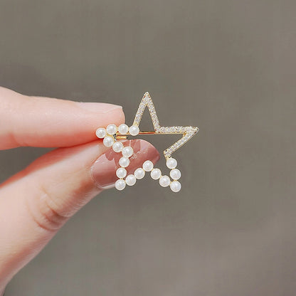 Broche étoile à zircons – doré