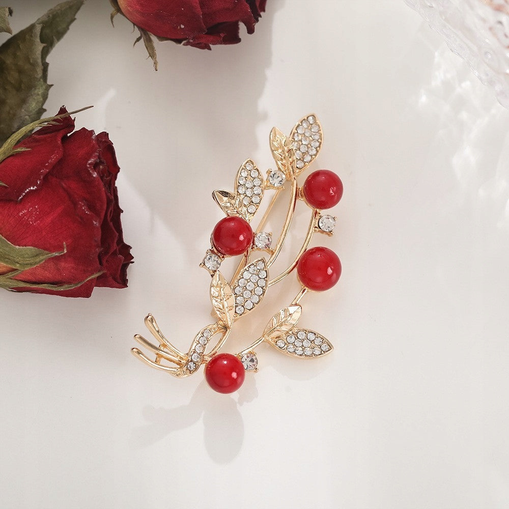 Broche rama con circonitas