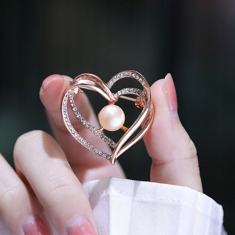 Broche cœur à zircons