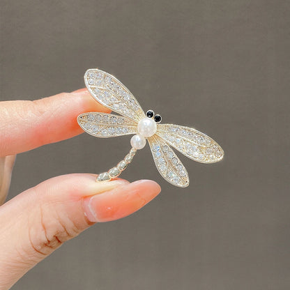 Brosche Libelle mit Zirkonia – goldfarben