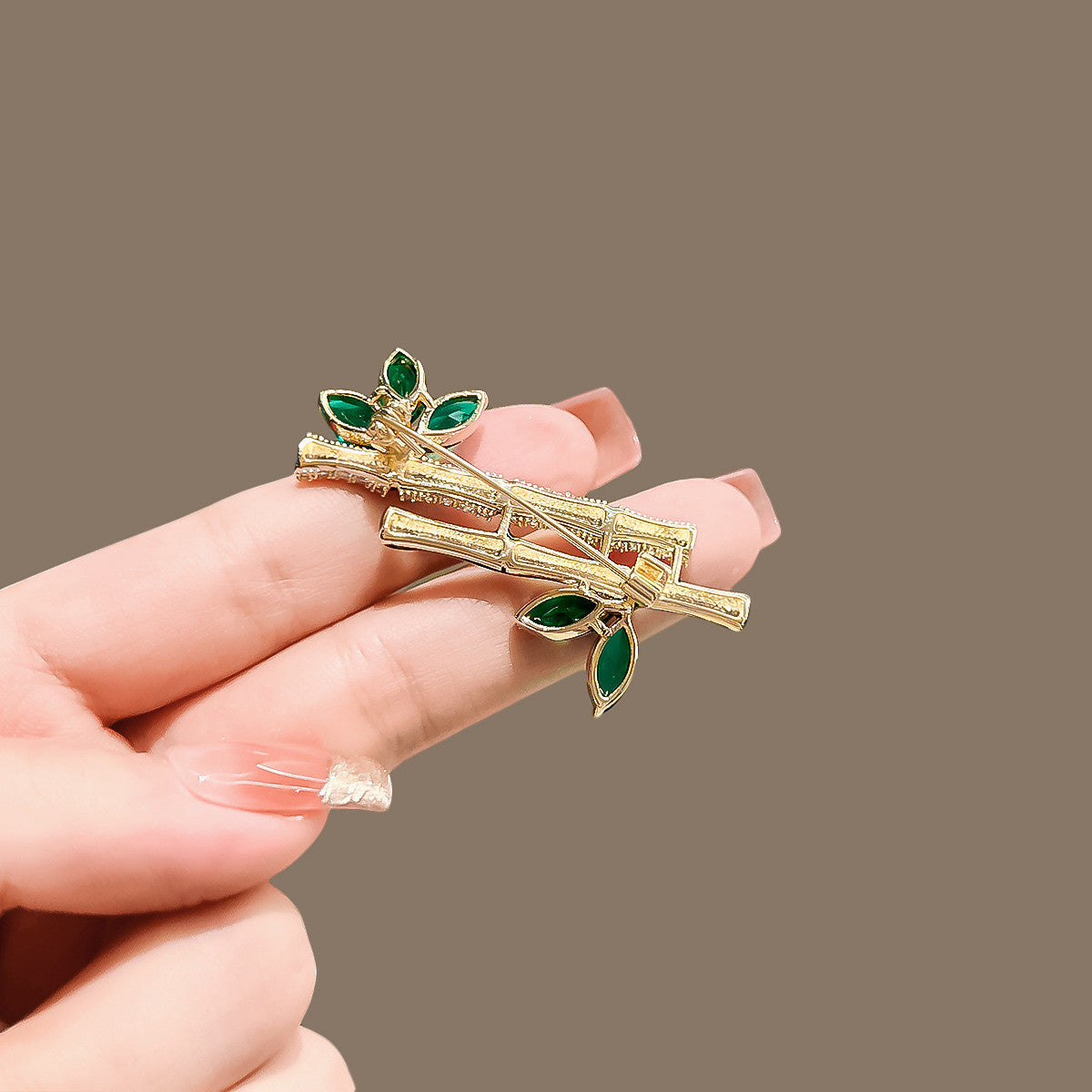 Distinctive Gold-Tone Two-Bamboo-Stem Brooch — Clothing Accessory, Leaves, Cubic Zirconia and a Pearl