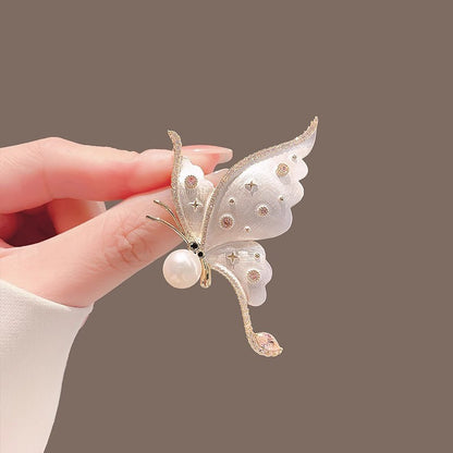 Copy of Distinctive Gold-Tone White Butterfly Brooch with Cubic Zirconia — Clothing Accessory, Leaves and a Pearl