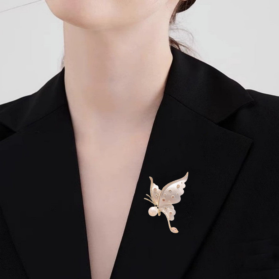 Copy of Distinctive Gold-Tone White Butterfly Brooch with Cubic Zirconia — Clothing Accessory, Leaves and a Pearl