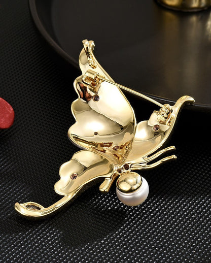 Copy of Distinctive Gold-Tone White Butterfly Brooch with Cubic Zirconia — Clothing Accessory, Leaves and a Pearl