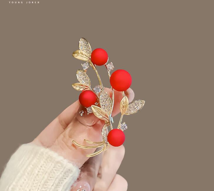Distinctive Gold-Tone Branch Brooch with Red Pearls — Clothing Accessory, Leaves and Cubic Zirconia