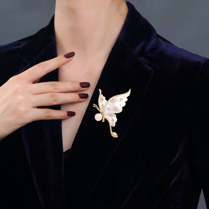 Copy of Distinctive Gold-Tone White Butterfly Brooch with Cubic Zirconia — Clothing Accessory, Leaves and a Pearl