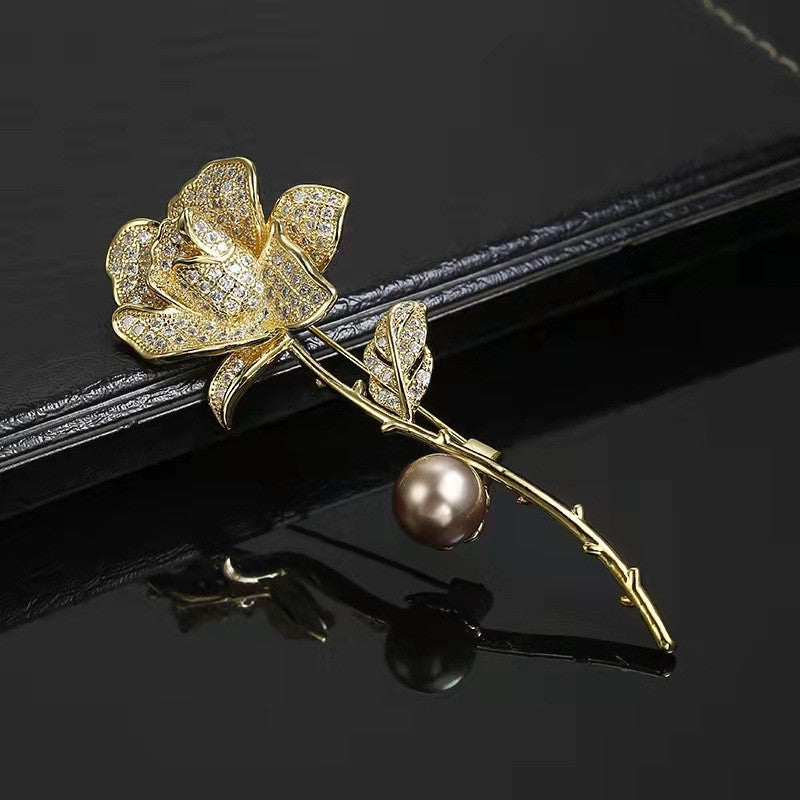 Distinctive Gold-Tone Rose Brooch with a Pearl — Clothing Accessory, Leaves and Cubic Zirconia
